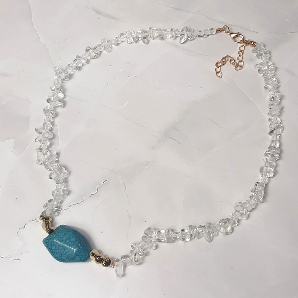 Clear beaded Necklace With Striated Faux Turquoise Center Stone